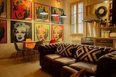 a living room with a couch and a table at Lucky Jazz BuddyRent in Rome