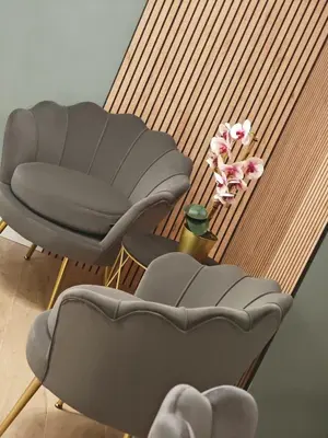 a living room with a couch and a chair at Domus Aldini in Rome