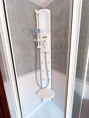 a shower in a bathroom with a toilet at Appartamento per le tue vacanze a Roma Villa Pamphili in Rome