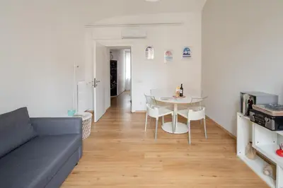 a living room with a couch and a table at Casa Filiberto in Rome