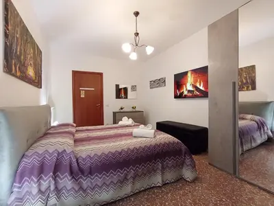 a bedroom with a bed in a room at La Dimora di Magi in Rome
