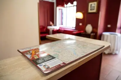 a map on top of a counter in a room at Imperial GuestHouse in Rome