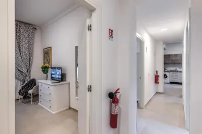 a hallway with a room with a fire hydrant at PMT Apt in Rome