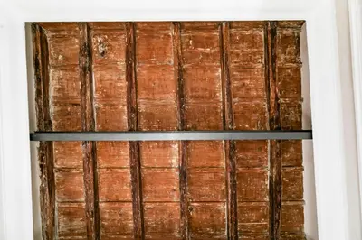a window in a room with wooden walls at Luxury apartment in Trastevere in Rome