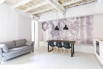 a living room with a couch and a table at Campo 13 Holiday Apartment in Rome