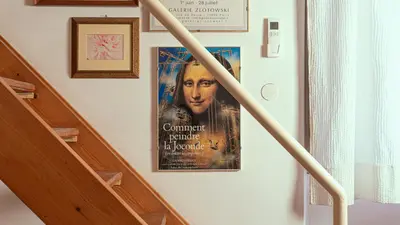 a poster of a movie hanging on a wall at Gallery Apartment, Near The Vatican in Rome