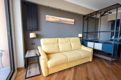 a living room with a couch and a table at Domus Aurelia Luxury in Rome