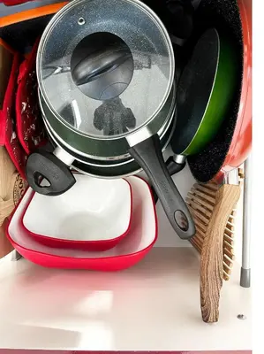 a kitchen utensils are stacked on top of each other at Betterplace in Rome