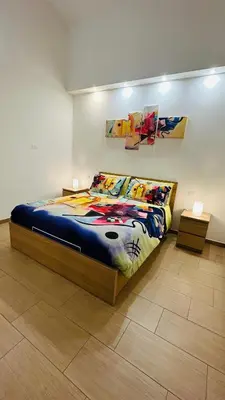 a bedroom with a large bed in a room at Betterplace in Rome