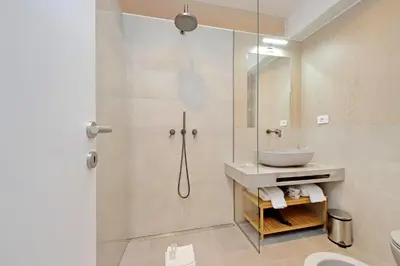 a bathroom with a shower and a sink at YCH-Casa Indipendente in zona Prati in Rome