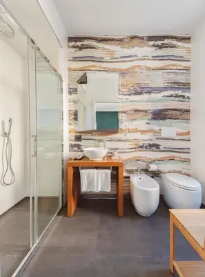 a bathroom with two sinks and a mirror at The Place Giuliana in Rome