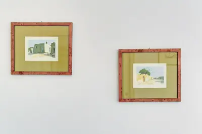 two framed pictures on a white wall at Home and More St. Angelo APT 5 in Rome
