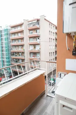 a balcony with a view of a building at Diamond Vatican Apartment in Rome