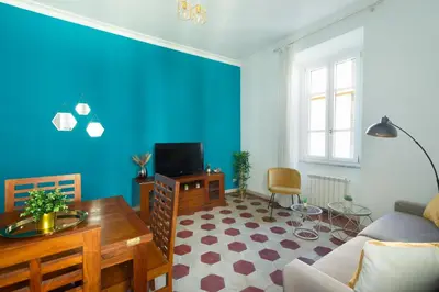 a living room with a couch and a table at G & G Maisonette Testaccio in Rome
