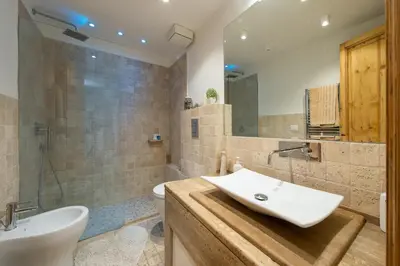 a bathroom with a sink and a toilet and a shower at ART ATELIER VITELLESCHI in Rome
