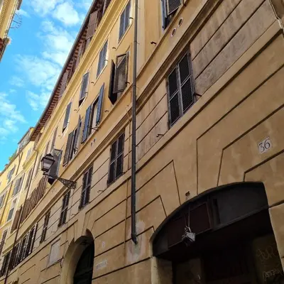 a building with a bunch of windows on it at Casa Nicoletta in Rome