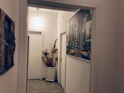 a hallway with a picture of a bus on the wall at CORNELIUS in Rome