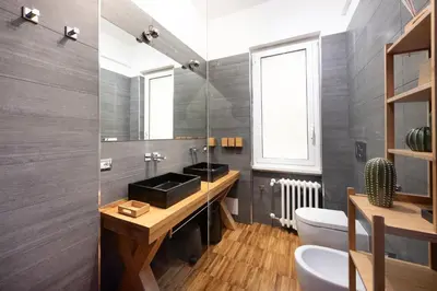 a bathroom with a sink and a toilet at Domus Rea - Vaticano - Metro Baldo degli Ubaldi in Rome