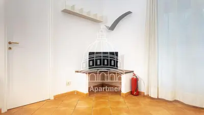 a room with a building with a sword on the wall at Vatican-Balduina Apartment in Rome