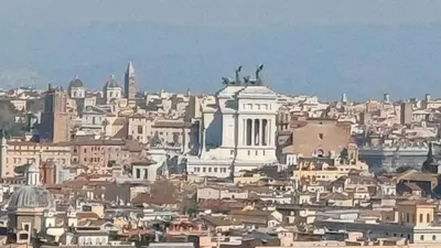 a view of a city with buildings and a monument at Chiara Stella Guest House in Rome