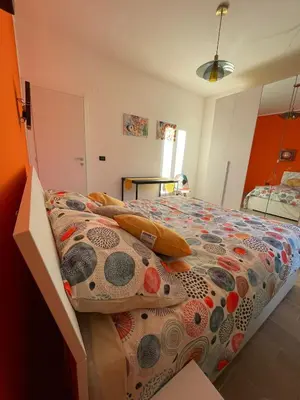a bed in a box in a bedroom at Zangàl al Vaticano - Metro Cornelia in Rome