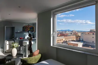 a window in a room with a view of a city at LA VUE DE PAULINE in Rome