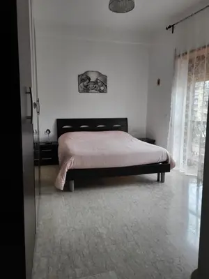 a bedroom with a tv on top of a cabinet at Home Sweet Home Tiburtina Station in Rome