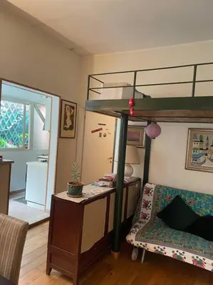 a living room with a bunk bed and a couch at Centro storico appartamento con terrazza in Rome