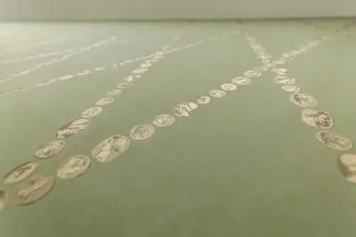 a group of dollar coins on a chain at B&B Toto al Vaticano in Rome