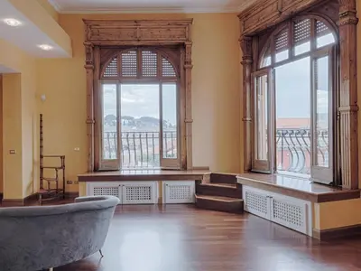 a large room with a tub and large windows at Apartment Le Colonne by Interhome in Rome