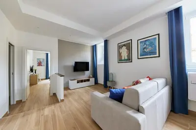 a living room with a couch and a tv at iFlat Lovely Modern Apartment in Rome