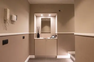 a bathroom with a sink and a mirror at Domus 213 Guest House - Boutique Suites in Auditorium, MAXXI, Villa Borghese, Piazza del Popolo in Rome