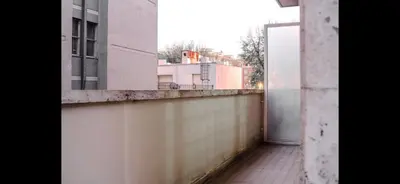 a view of an empty balcony of a building at Monti Exclusive Apartment in Rome