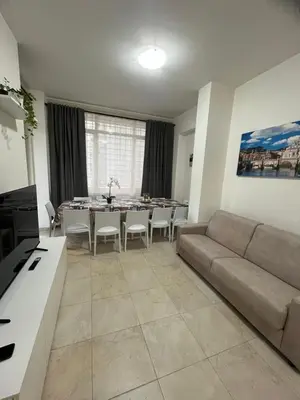 a living room with a couch and a table at Monti Royal Apartment in Rome
