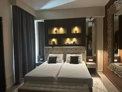 a bedroom with a large bed and a window at Adelaide Suite Dreams in Rome