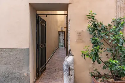 an entrance to a building with an open door at R22 Apartment in Rome