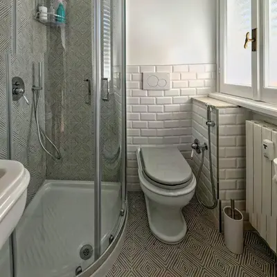 a bathroom with a toilet and a shower at Splendido appartamento in Rome