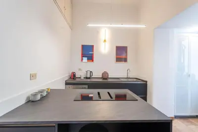 a kitchen counter with a tea kettle on top of it at PgrHome Barberini in Rome