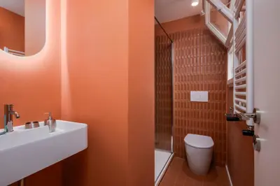 a bathroom with a sink and a toilet at Prati Zen Boutique Studio-ZEN37 in Rome
