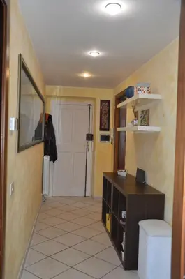 a room with a hallway with a door and a room with a room at Oasi San Pietro in Rome