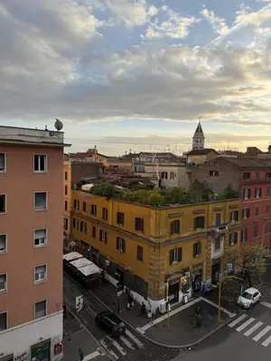 an aerial view of a city with buildings at San Lorenzo House in Rome