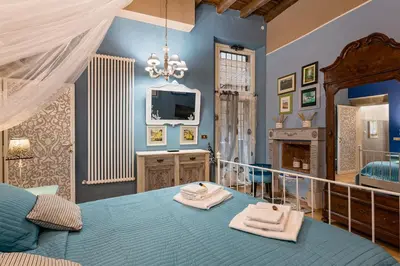 a bedroom with a bed with two towels on it at Rome as you feel - Vicolo delle Grotte in Rome