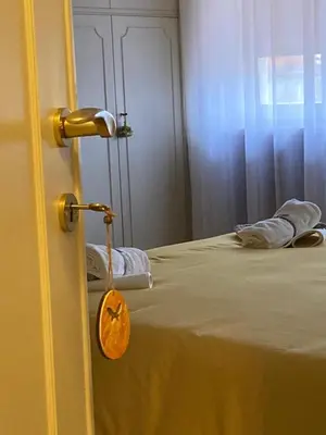 a close up of a bedroom door with a bed at Le Mille e Una Notte in Rome