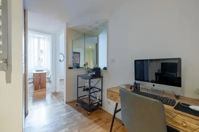 an office with a desk with a computer on it at Venere in Trevi in Rome