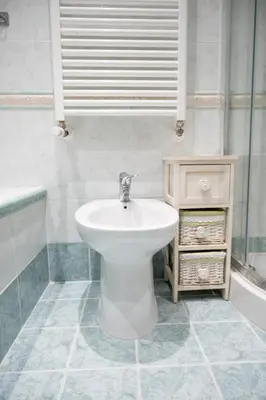 a bathroom with a toilet and a sink and a tub at INTERNO 39 - San Pietro in Rome