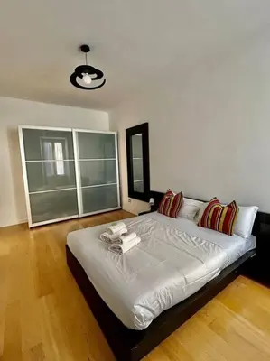 a bedroom with a large bed in a room at Angel House - balcony and view in Rome