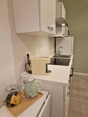 a kitchen with a tea kettle on a counter at Casina Valtellina in Rome