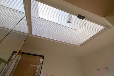 a skylight in the ceiling of a room at Le Petit Prince in Rome