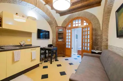 a living room with a couch and a table at Le Petit Prince in Rome