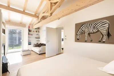 a room with a painting of a zebra on the wall at Rome Design Villa in Rome